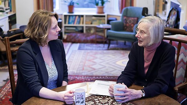 Cheney talking to someone about energy bills