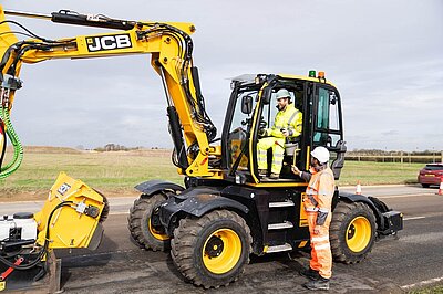 Alex in a JCB