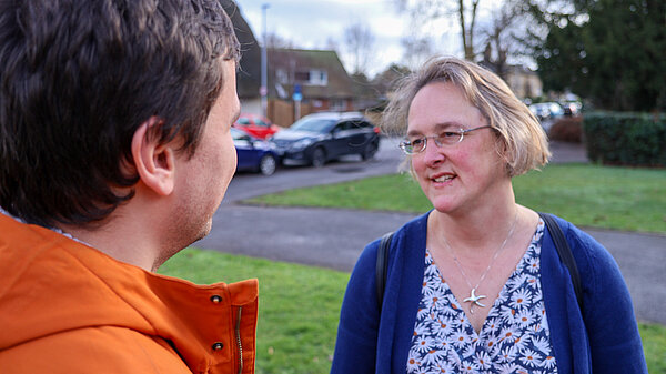 Katie talking to someone